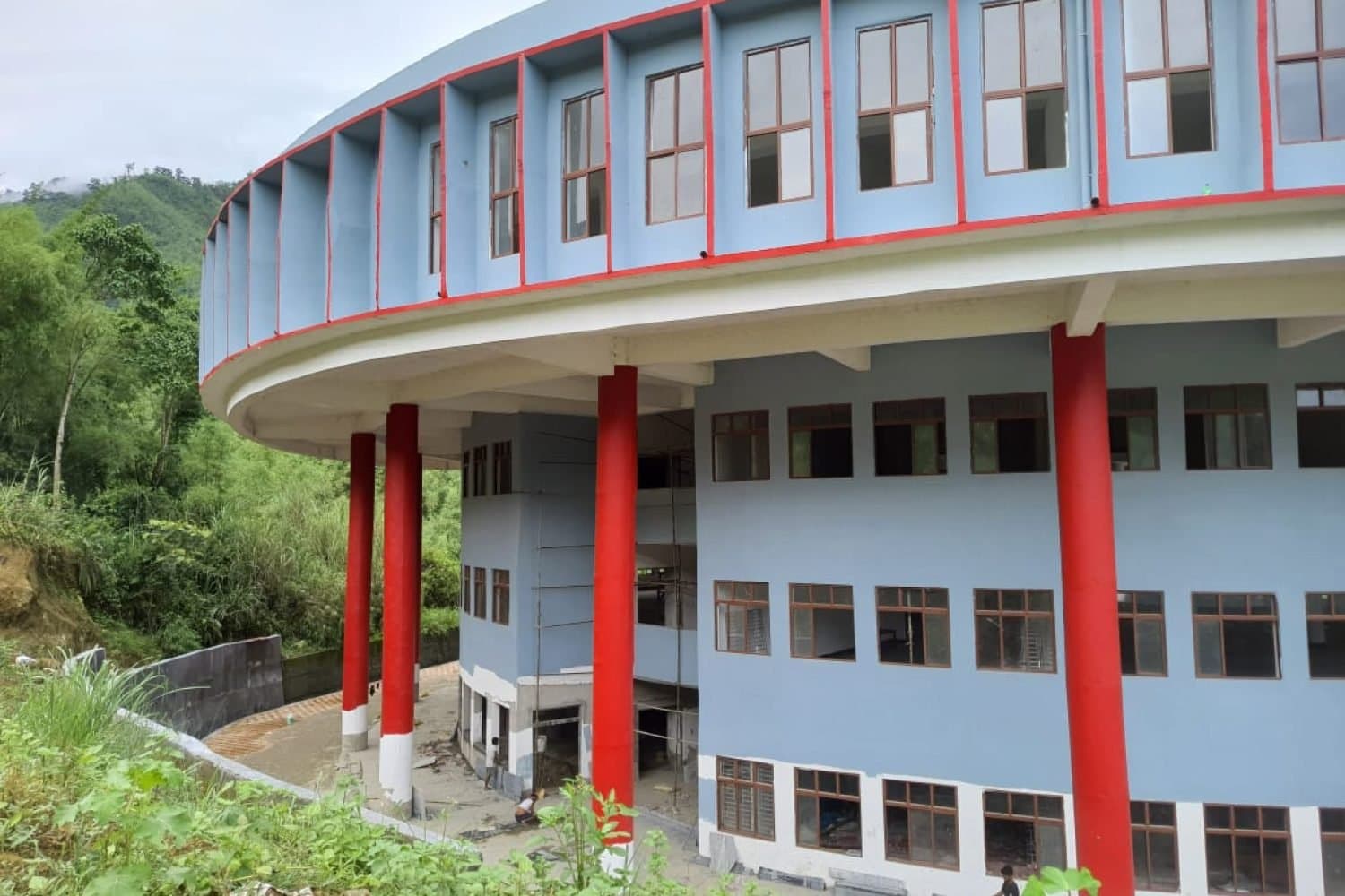 Upgraded hospital block on a green Arunachal hillside