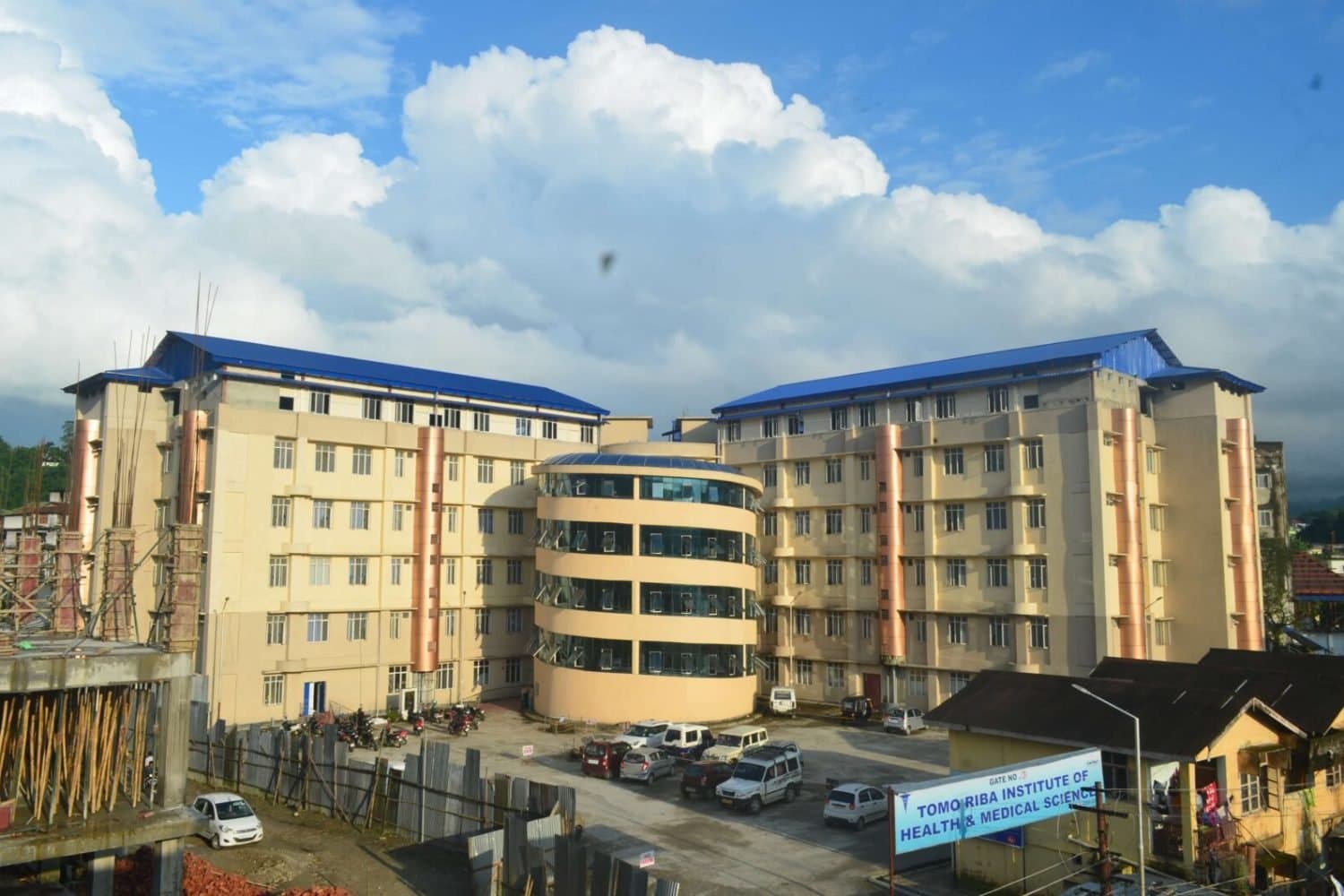 The TRIHMS medical campus at Naharlagun under a dramatic sky